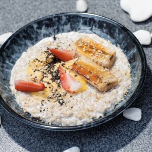 Oatmeal with milk and mango and banana